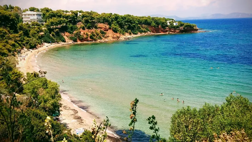 Kokkino Limanaki beach near Rafina — red earth and a picturesque rocky cove