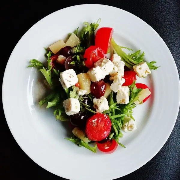 Greek salad with feta, tomatoes and olives